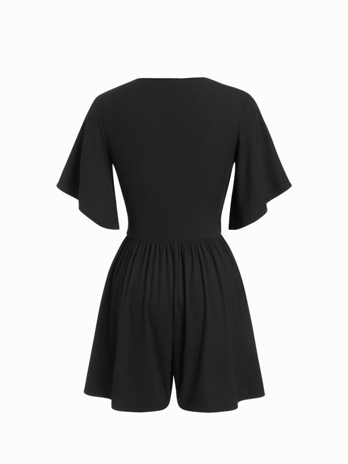 Robe noire élégante à col en V et manches évasées